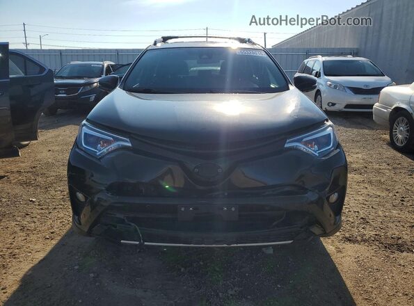 2T3JFREV9HW654059 2017 TOYOTA RAV4 Black Front view