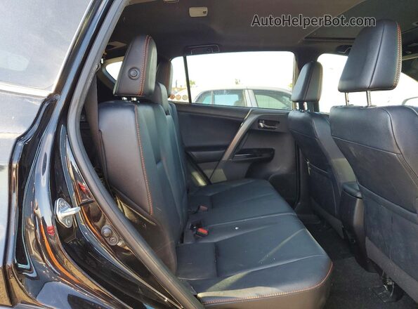 2T3JFREV9HW654059 2017 TOYOTA RAV4 Black Rear interior view