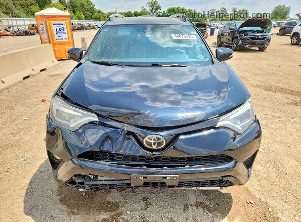 2T3JFREVXJW785698 2018 TOYOTA RAV4 Черный Вид спереди
