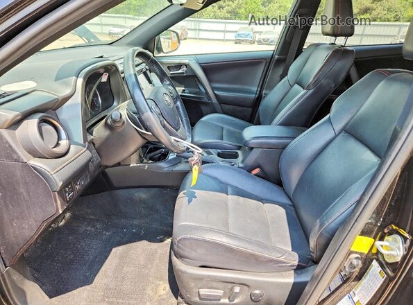 2T3JFREVXJW785698 2018 TOYOTA RAV4 Черный Вид салона спереди