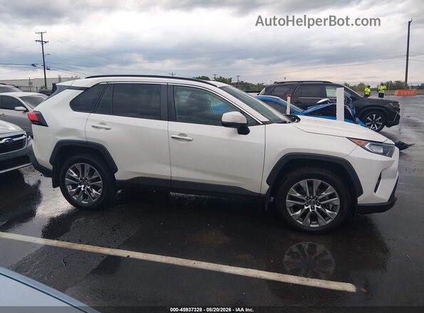2T3N1RFV1KW075282 2019 TOYOTA RAV4 White Vista interior trasera