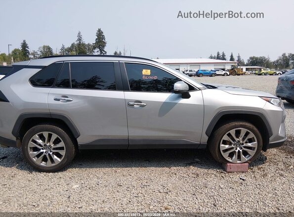 2T3N1RFV4KW040588 2019 TOYOTA RAV4 Silver Vista interior trasera