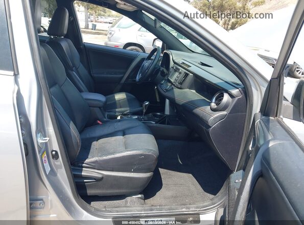 2T3NFREV4GW307352 2016 TOYOTA RAV4 Silver წინა სალონის ხედი
