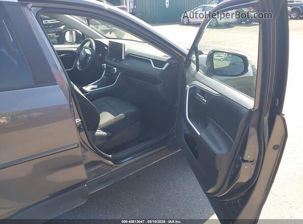 2T3P1RFV0PC333437 2023 TOYOTA RAV4 Gray Vista interior delantera