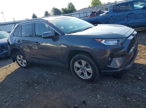 2T3P1RFVXKC055140 2019 TOYOTA RAV4 Серый Передняя правая четверть