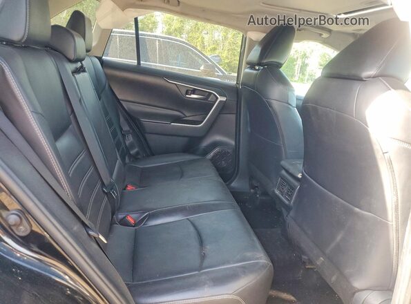 2T3R1RFV2KW026335 2019 TOYOTA RAV4 Black Vista interior trasera