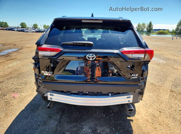 2T3R1RFV2RC447144 2024 TOYOTA RAV4 Black Հետևի տեսք