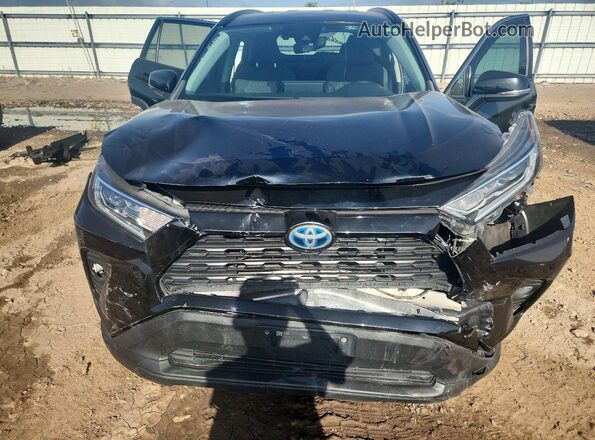2T3R6RFV1MW013659 2021 TOYOTA RAV4 Black Vista interior trasera
