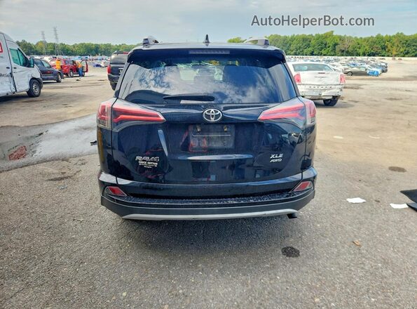 2T3RFREV0GW527671 2016 TOYOTA RAV4 Black უკანა ხედი