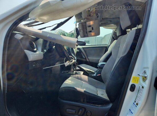 2T3RFREV0JW808716 2018 TOYOTA RAV4 White Front interior view