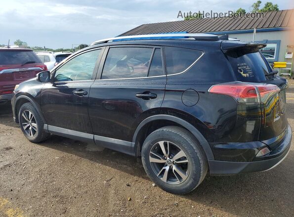 2T3RFREV1GW535844 2016 TOYOTA RAV4 Black Rear left