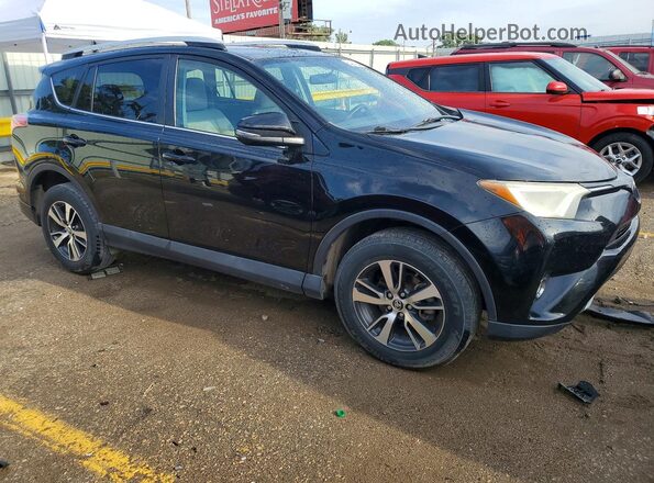 2T3RFREV1GW535844 2016 TOYOTA RAV4 Black Front right