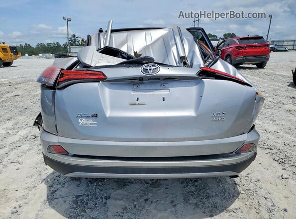 2T3RFREV1HW670694 2017 TOYOTA RAV4 Silver Հետևի տեսք