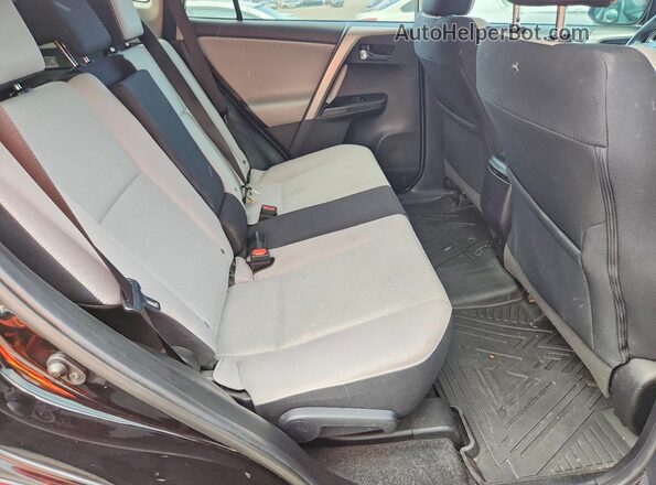 2T3RFREV1JW749482 2018 TOYOTA RAV4 Черный Вид задней части салона