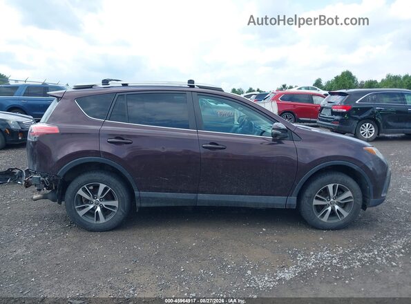 2T3RFREV1JW778111 2018 TOYOTA RAV4 Purple Вид задньої частини салону