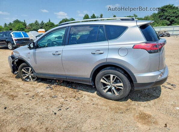 2T3RFREV2JW704955 2018 TOYOTA RAV4 Silver Tył lewy