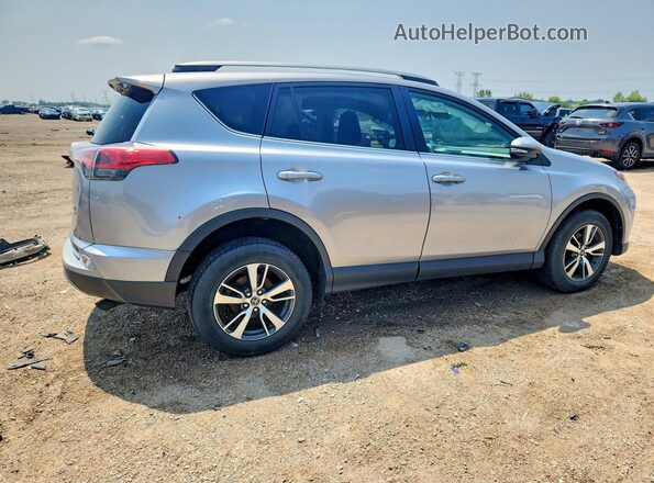 2T3RFREV2JW704955 2018 TOYOTA RAV4 Silver Tył prawy