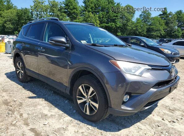 2T3RFREV2JW756960 2018 TOYOTA RAV4 Gray Delantero derecho