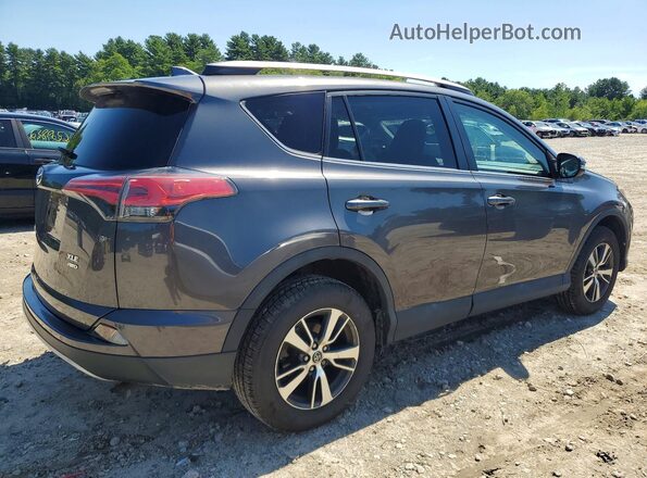2T3RFREV2JW756960 2018 TOYOTA RAV4 Gray Trasero derecho