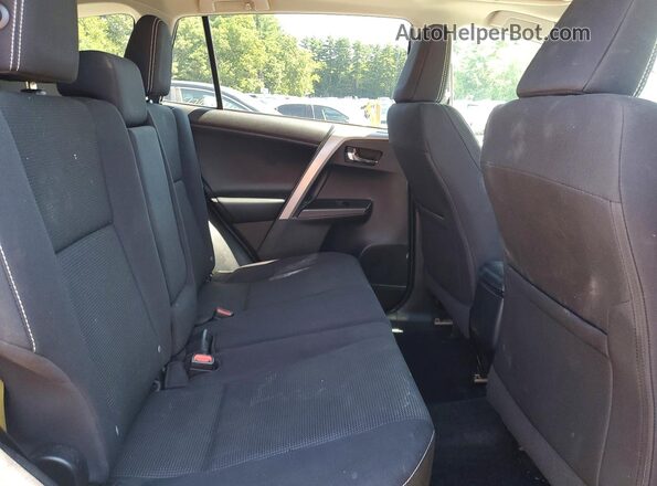 2T3RFREV2JW756960 2018 TOYOTA RAV4 Gray Vista interior trasera