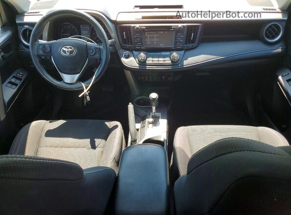 2T3RFREV2JW756960 2018 TOYOTA RAV4 Gray Vista del salpicadero