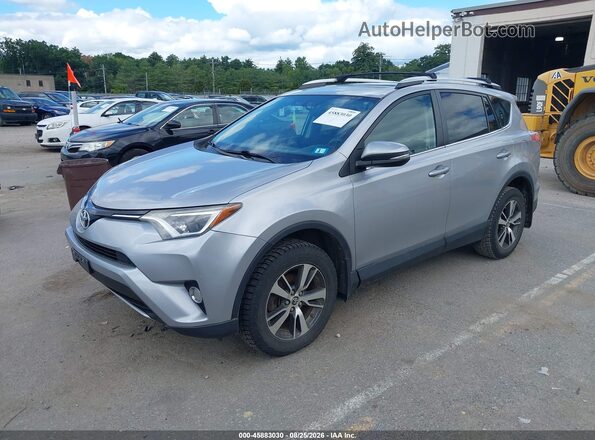 2T3RFREV3GW502764 2016 TOYOTA RAV4 Silver Առջևի ձախ երեք քառորդ տեսարան
