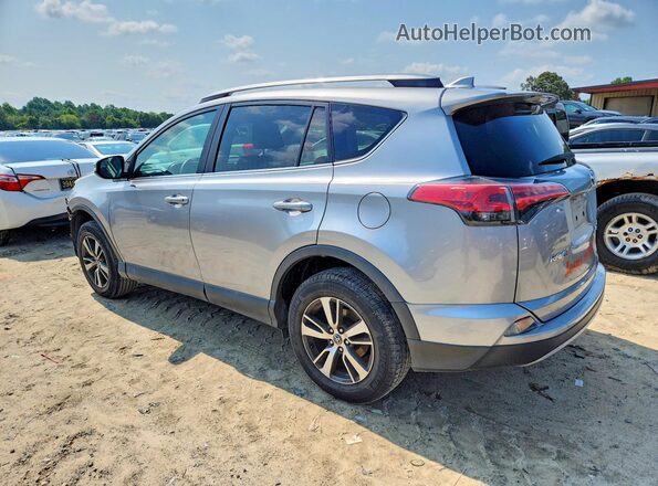 2T3RFREV3HW554106 2017 TOYOTA RAV4 Silver Հետևի ձախ
