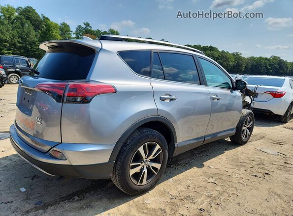 2T3RFREV3HW554106 2017 TOYOTA RAV4 Silver Հետևի աջ