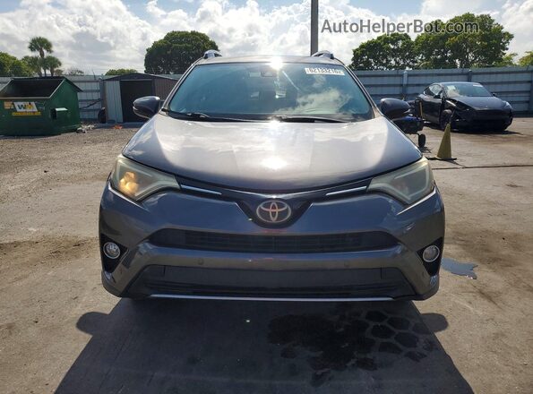 2T3RFREV3JW749869 2018 TOYOTA RAV4 Серый Вид спереди