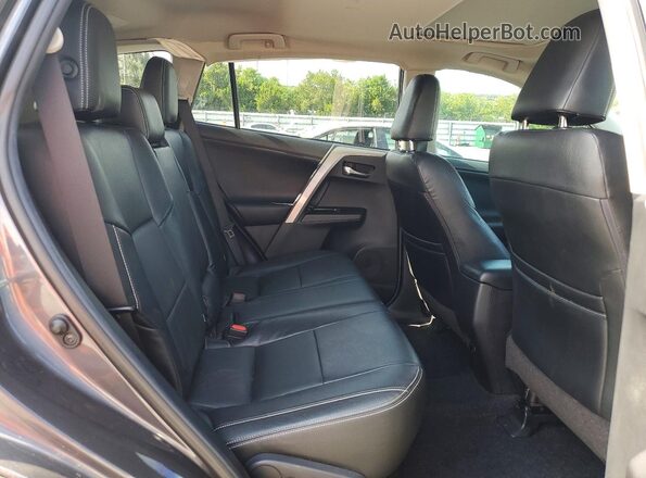 2T3RFREV3JW749869 2018 TOYOTA RAV4 Серый Вид задней части салона