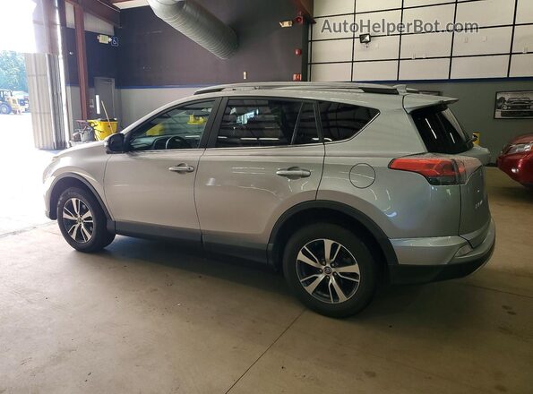 2T3RFREV3JW796397 2018 TOYOTA RAV4 Silver Trasero izquierdo