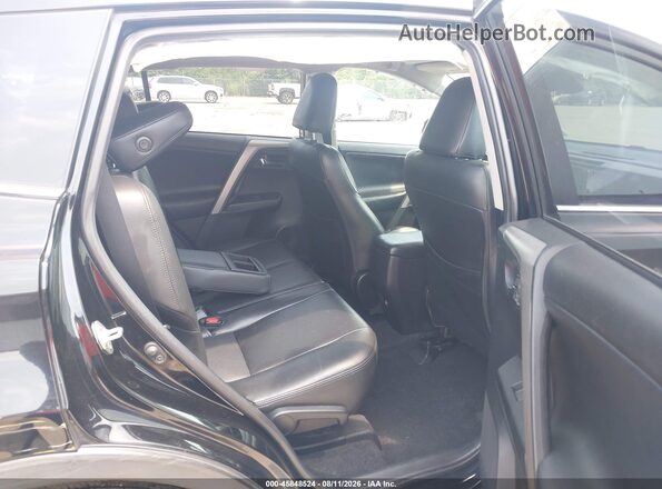 2T3RFREV3JW804918 2018 TOYOTA RAV4 Black VIN კოდის სტიკერის ხედი