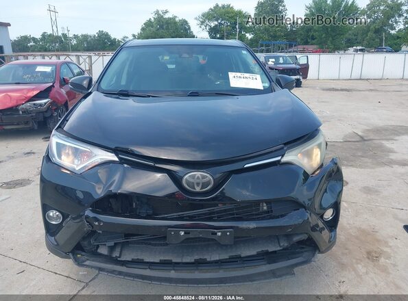 2T3RFREV3JW804918 2018 TOYOTA RAV4 Black ხელსაწყოთა პანელის ხედი