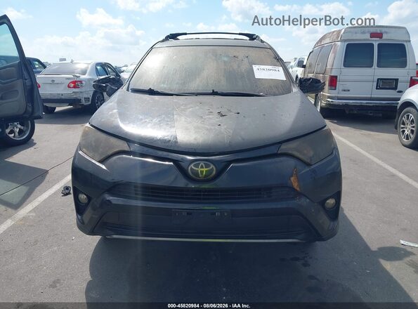 2T3RFREV3JW810332 2018 TOYOTA RAV4 Black Front view