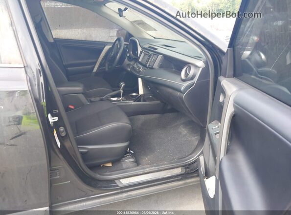2T3RFREV3JW810332 2018 TOYOTA RAV4 Black Front interior view