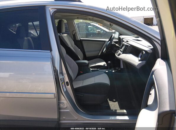2T3RFREV4GW411602 2016 TOYOTA RAV4 Silver Front interior view