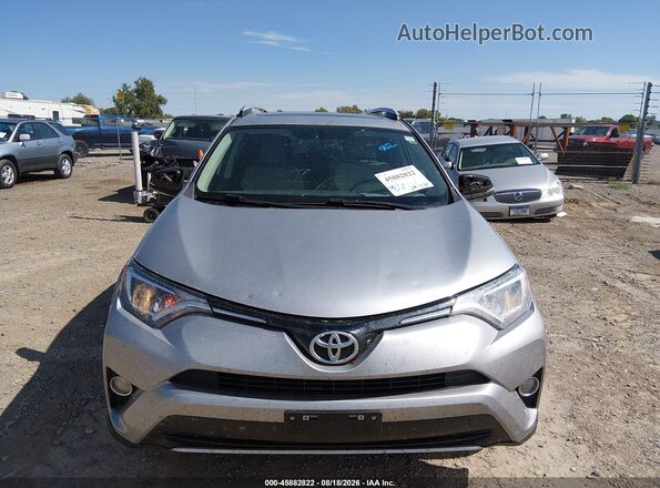 2T3RFREV4GW411602 2016 TOYOTA RAV4 Silver Front view