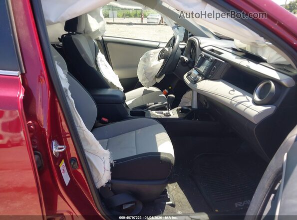 2T3RFREV4JW710997 2018 TOYOTA RAV4 Red წინა სალონის ხედი
