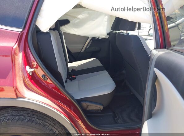 2T3RFREV4JW710997 2018 TOYOTA RAV4 Red VIN კოდის სტიკერის ხედი