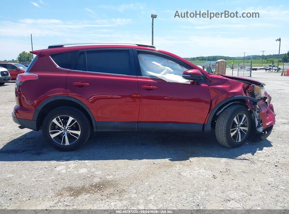 2T3RFREV4JW710997 2018 TOYOTA RAV4 Red უკანა სალონის ხედი