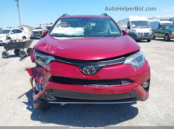 2T3RFREV4JW710997 2018 TOYOTA RAV4 Red ხელსაწყოთა პანელის ხედი