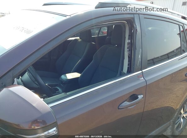 2T3RFREV4JW720672 2018 TOYOTA RAV4 Purple 