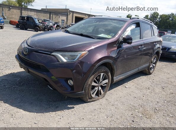 2T3RFREV4JW776028 2018 TOYOTA RAV4 Maroon Vista tres cuartos delantera izquierda