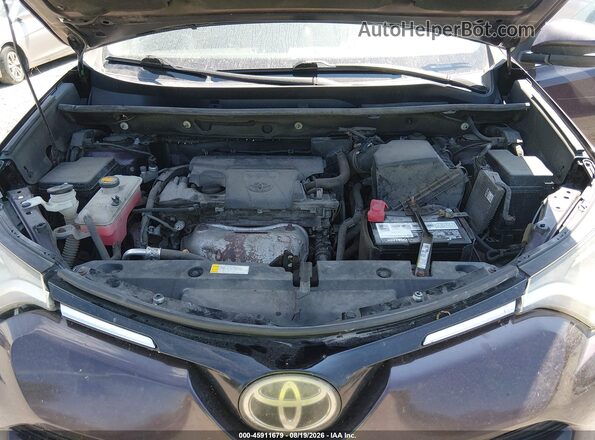 2T3RFREV4JW776028 2018 TOYOTA RAV4 Maroon Vista trasera