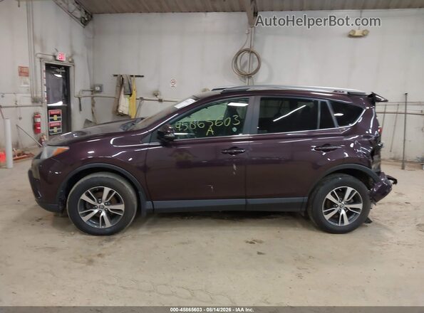 2T3RFREV4JW789474 2018 TOYOTA RAV4 Черный Вид задней части салона