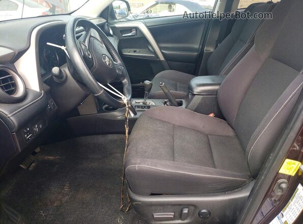 2T3RFREV4JW812817 2018 TOYOTA RAV4 Purple Widok wnętrza z przodu