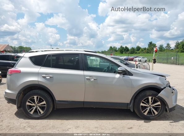 2T3RFREV5GW485451 2016 TOYOTA RAV4 Silver Вид задньої частини салону