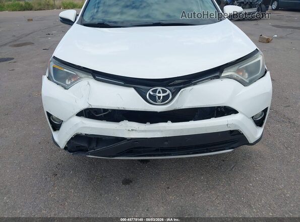 2T3RFREV5GW515967 2016 TOYOTA RAV4 White Front view