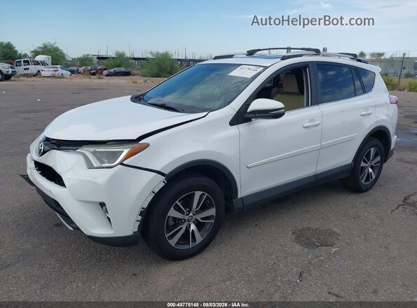 2T3RFREV5GW515967 2016 TOYOTA RAV4 White Front left