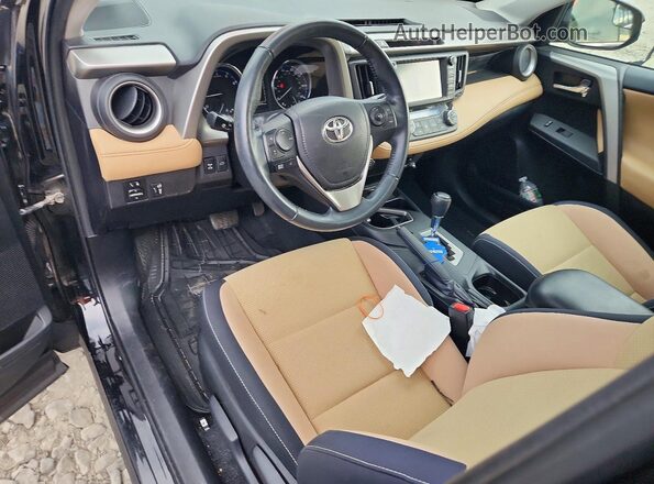 2T3RFREV6GW429700 2016 TOYOTA RAV4 Black Vista del salpicadero